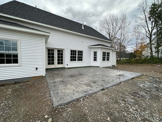 rear view of property featuring a patio