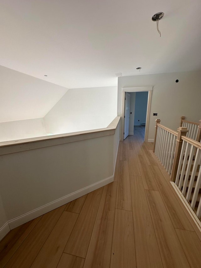 corridor featuring light hardwood / wood-style floors