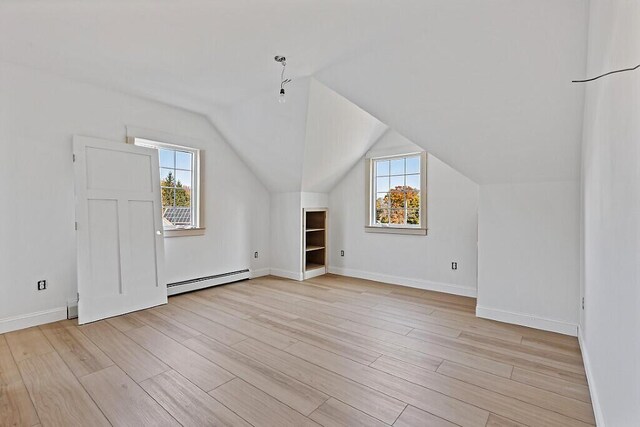 LOT1 Honey Hill Ests W, Hampden, ME 04444 - bonus room featuring a baseboard heating unit, light wood-style flooring, and vaulted ceiling