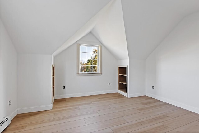 LOT1 Honey Hill Ests W, Hampden, ME 04444 - additional living space featuring baseboard heating, light wood-style flooring, and lofted ceiling