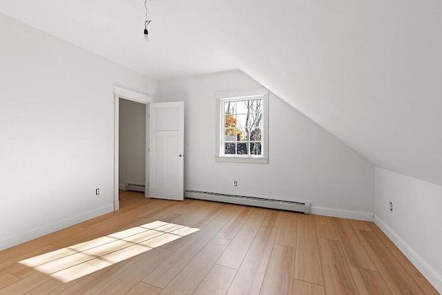 LOT1 Honey Hill Ests W, Hampden, ME 04444 - additional living space with baseboard heating, light wood-type flooring, and vaulted ceiling