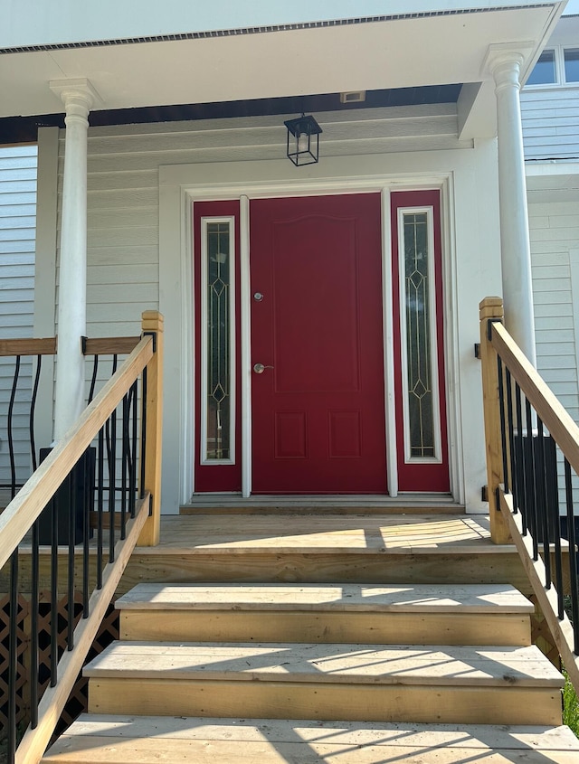 property entrance with covered porch