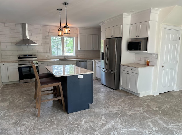 kitchen featuring a breakfast bar, light tile floors, stainless steel appliances, wall chimney exhaust hood, and backsplash