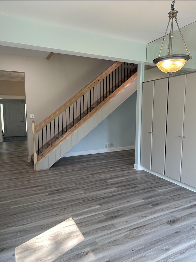 interior space with dark hardwood / wood-style flooring