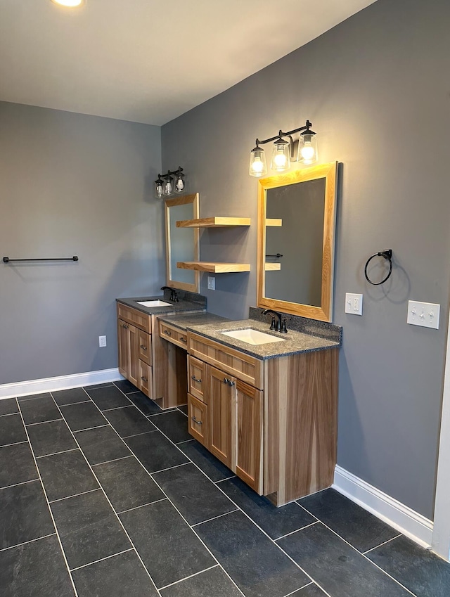 bathroom with dual sinks, tile floors, and vanity with extensive cabinet space