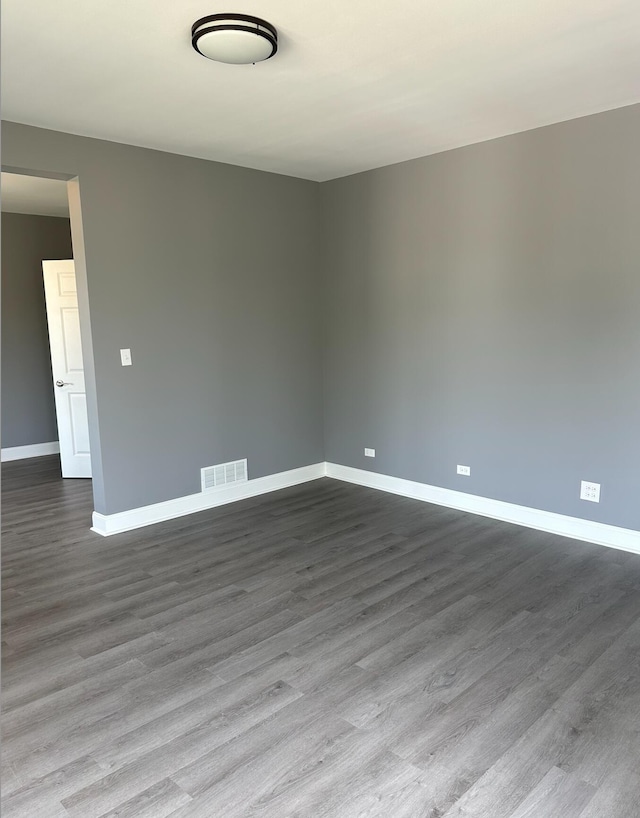 spare room featuring light hardwood / wood-style floors