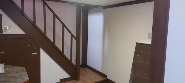 staircase featuring light wood-type flooring