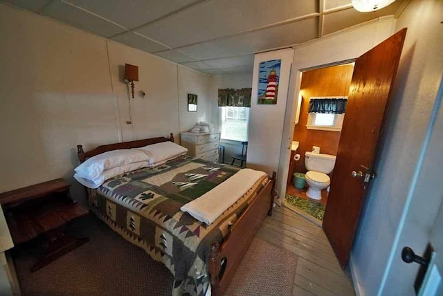 bedroom featuring dark hardwood / wood-style flooring