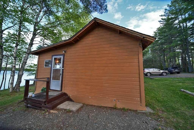 view of home's exterior featuring a yard