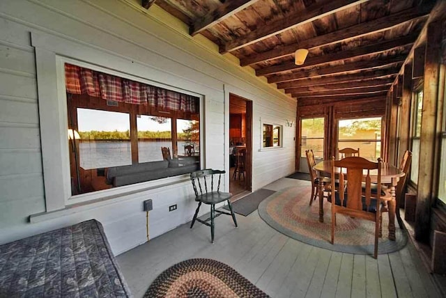 sunroom / solarium with wood ceiling and beamed ceiling