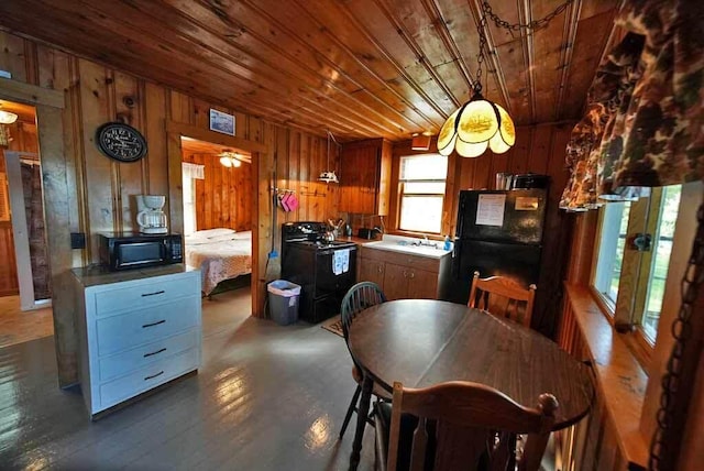 dining space with wooden ceiling, wooden walls, and dark hardwood / wood-style flooring