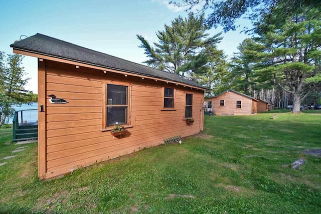 view of home's exterior with a yard