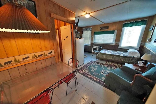 kitchen featuring wood walls