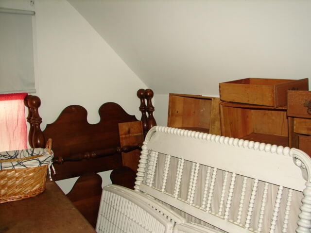 bedroom with vaulted ceiling