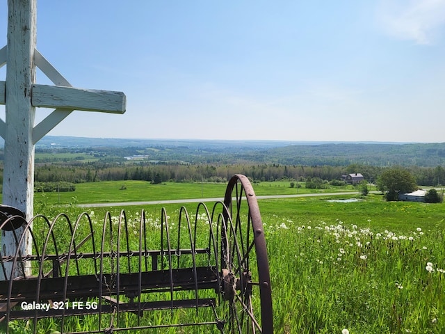 exterior space with a rural view