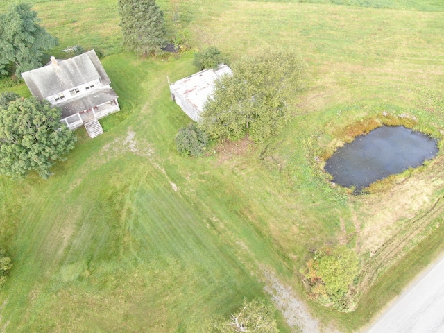 bird's eye view with a rural view and a water view