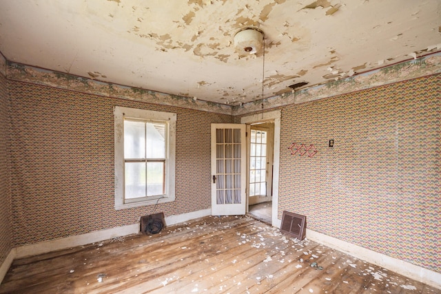 empty room featuring french doors