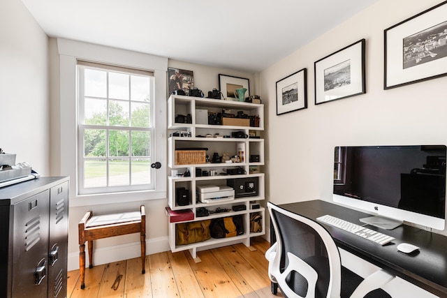 office area with light hardwood / wood-style flooring