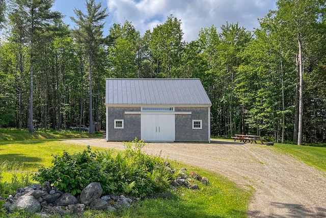 garage with a lawn