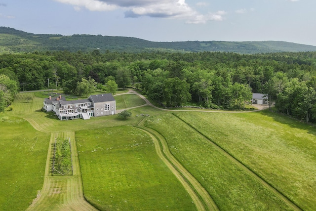 birds eye view of property featuring a rural view