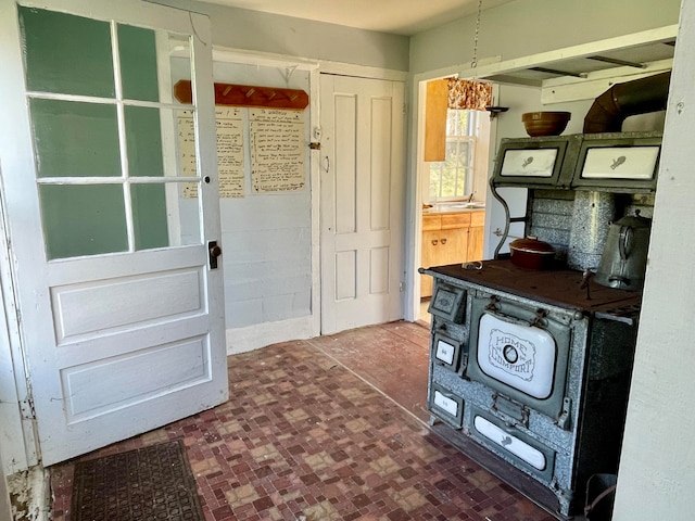 interior space featuring dark tile floors