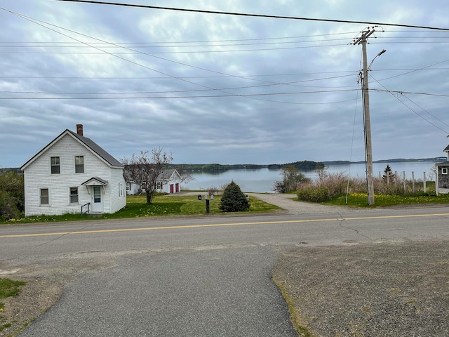 view of road featuring a water view