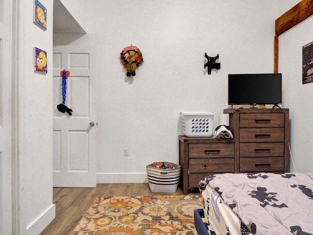 bedroom featuring light wood-type flooring