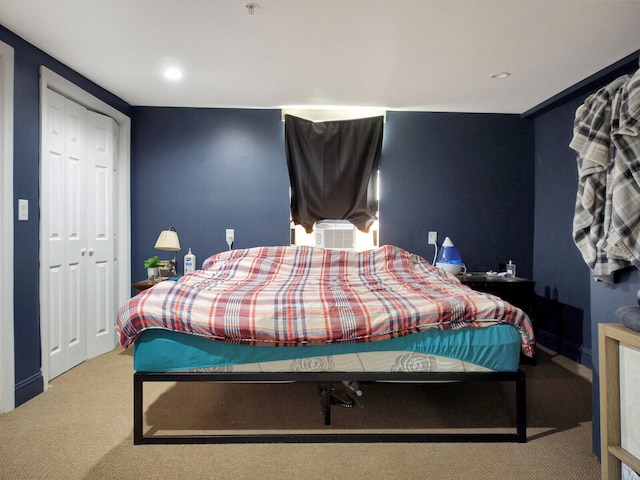 carpeted bedroom with a closet