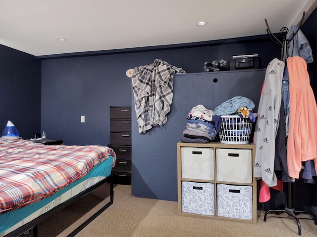 bedroom with light carpet