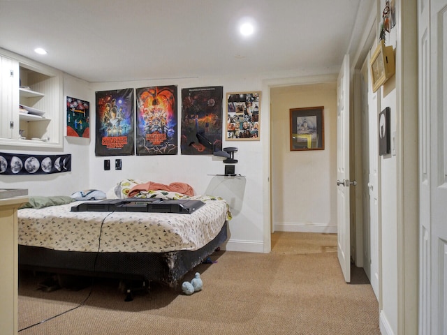 bedroom with light colored carpet