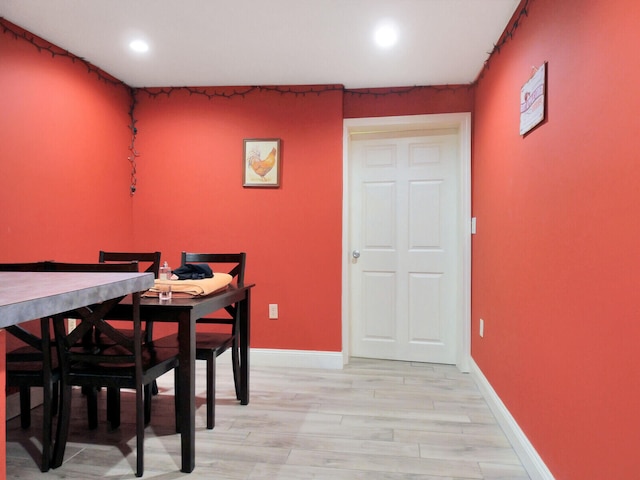 dining area with light wood-type flooring