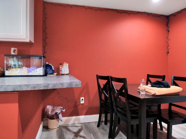 dining room with light hardwood / wood-style floors