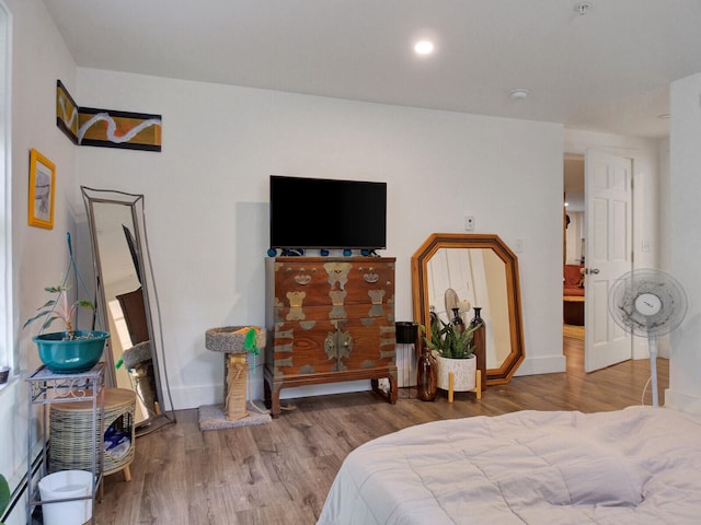 bedroom featuring hardwood / wood-style floors