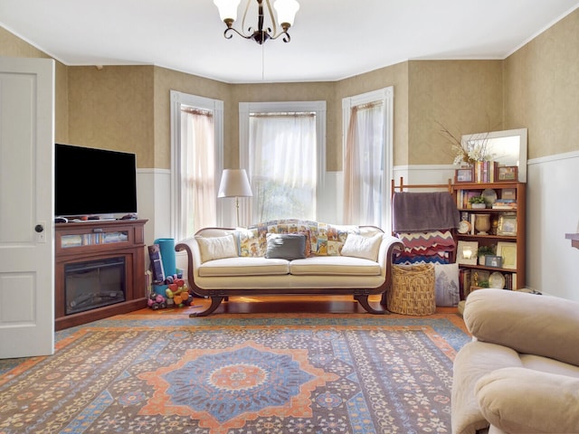 living room featuring a chandelier