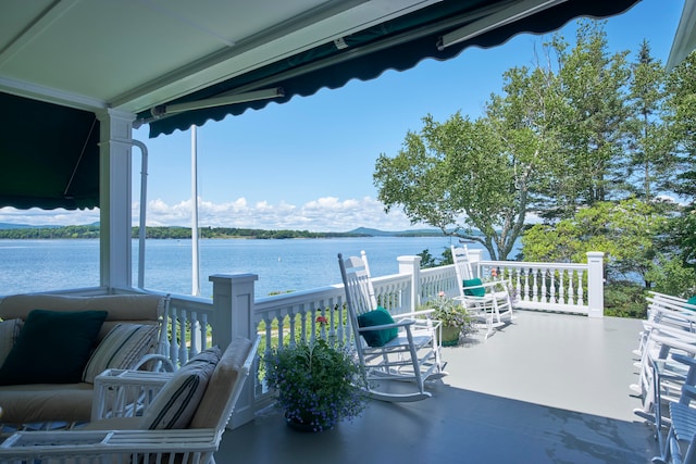 view of patio / terrace with a water view