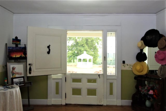 doorway to outside featuring dark hardwood / wood-style floors