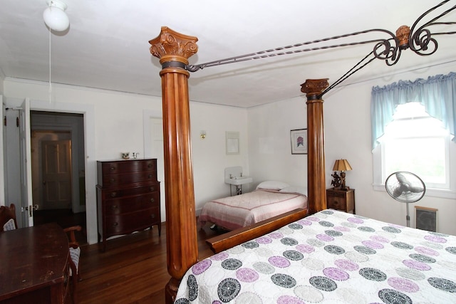 bedroom featuring dark hardwood / wood-style floors