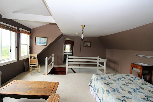 carpeted bedroom featuring vaulted ceiling