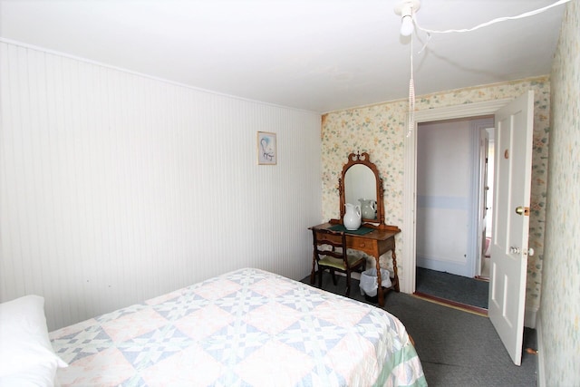 bedroom with dark carpet and ceiling fan