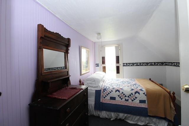 bedroom featuring vaulted ceiling