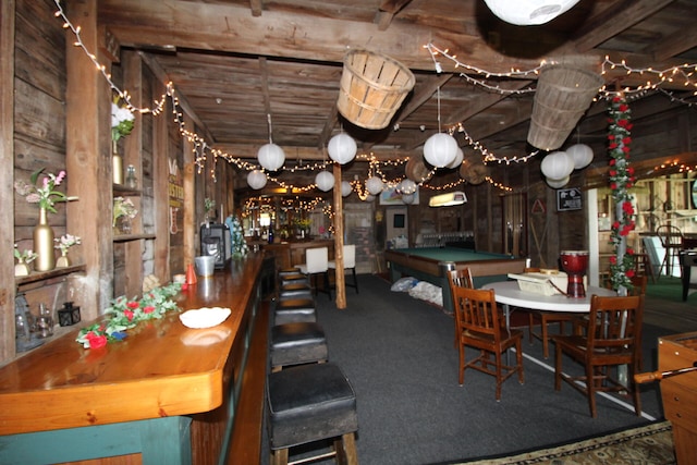 unfurnished dining area with indoor bar and pool table