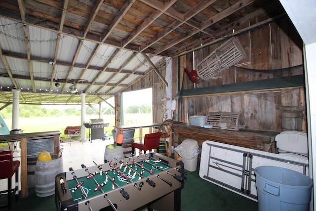 playroom with vaulted ceiling