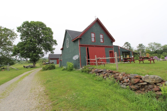 view of home's exterior featuring a yard