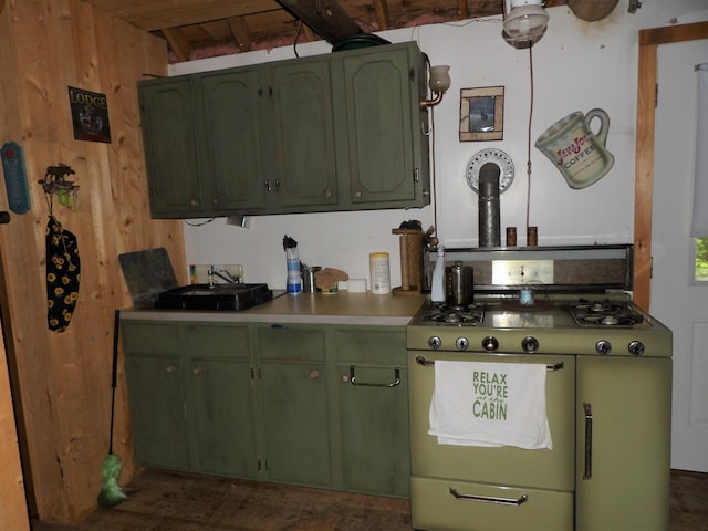 kitchen featuring wood walls, range with two ovens, beam ceiling, wood ceiling, and green cabinetry