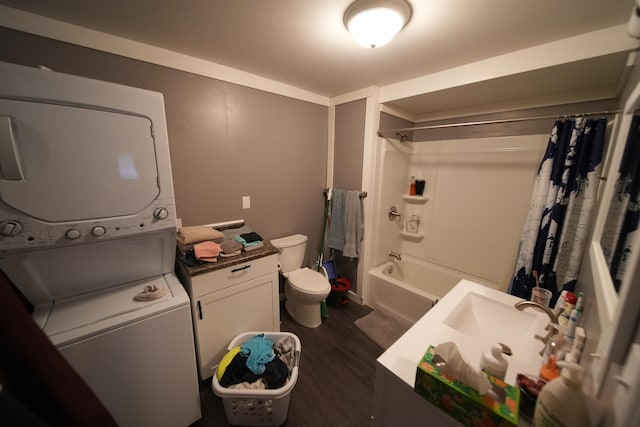 full bathroom with shower / bath combo with shower curtain, toilet, hardwood / wood-style floors, and vanity