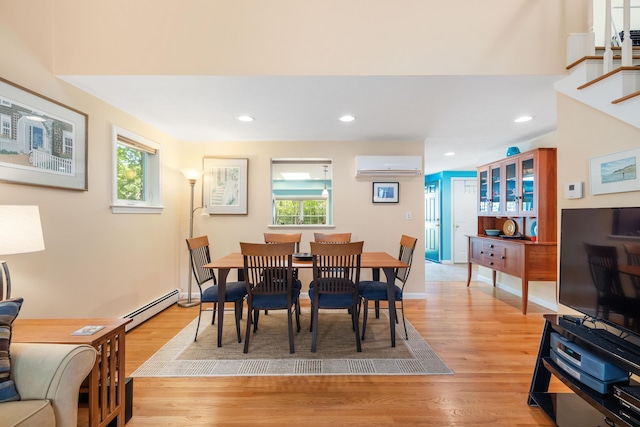 76 Heritage Dr Unit 5, Wells, ME 04090 - dining room featuring baseboard heating, a wall mounted air conditioner, plenty of natural light, light wood-style floors, and recessed lighting
