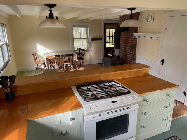 122 Main St, Cranberry Isles, ME 04646 - kitchen with hanging light fixtures, white gas range, dark hardwood / wood-style flooring, and beamed ceiling