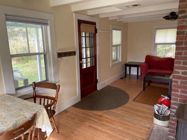 122 Main St, Cranberry Isles, ME 04646 - entryway featuring light hardwood / wood-style floors, a wealth of natural light, and beamed ceiling
