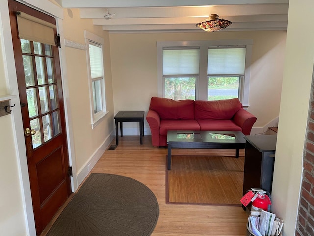 122 Main St, Cranberry Isles, ME 04646 - living room with light hardwood / wood-style flooring and beam ceiling