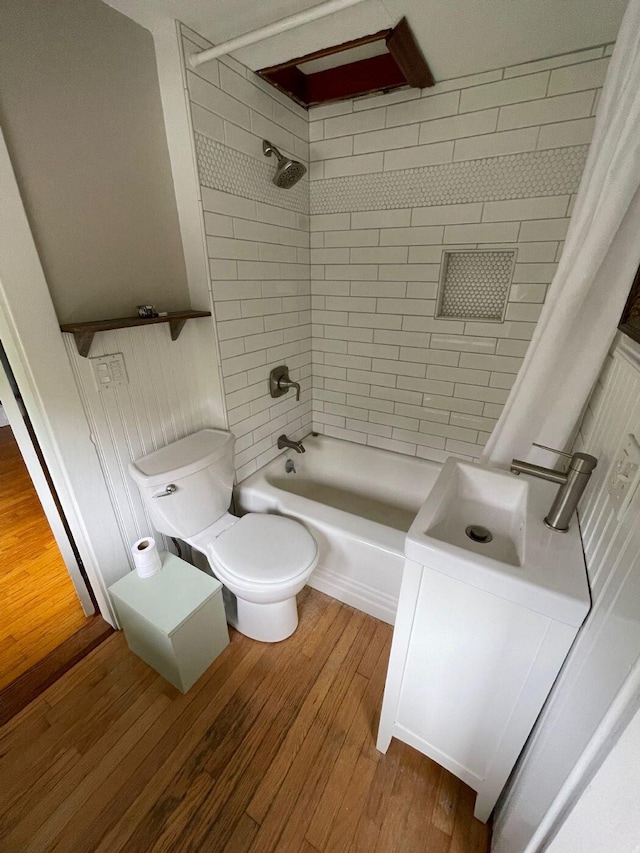 122 Main St, Cranberry Isles, ME 04646 - full bathroom with vanity, hardwood / wood-style floors, toilet, and shower / bathtub combination with curtain